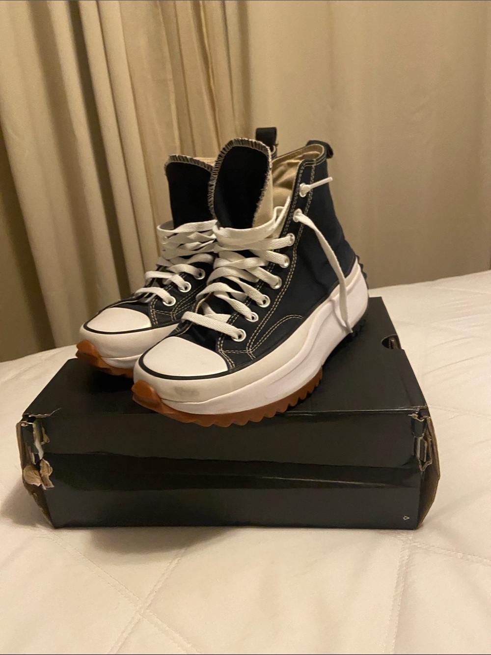 Converse High-Top Platform Lug Sneakers in Black and White